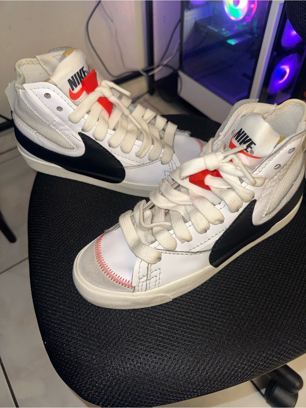 Nike White High-Top Sneakers with Black Swoosh & Red Accents